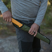 Thumbnail for A man holding the Agawa 21 Olive Cordura sheath in his left hand while pulling the Boreal saw from the sheath with his right hand, highlighting the sheath's durability and functionality.






