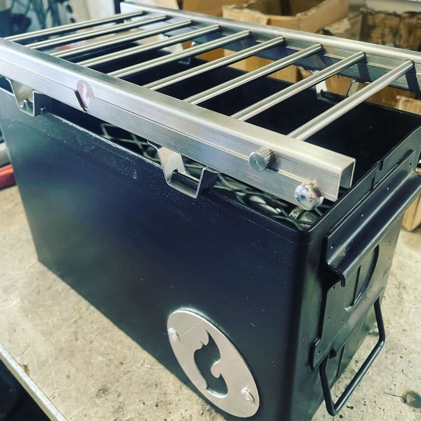 Side angle of LavaBox Over-Under Grill Thingy 2.0, highlighting durable grilling surface.