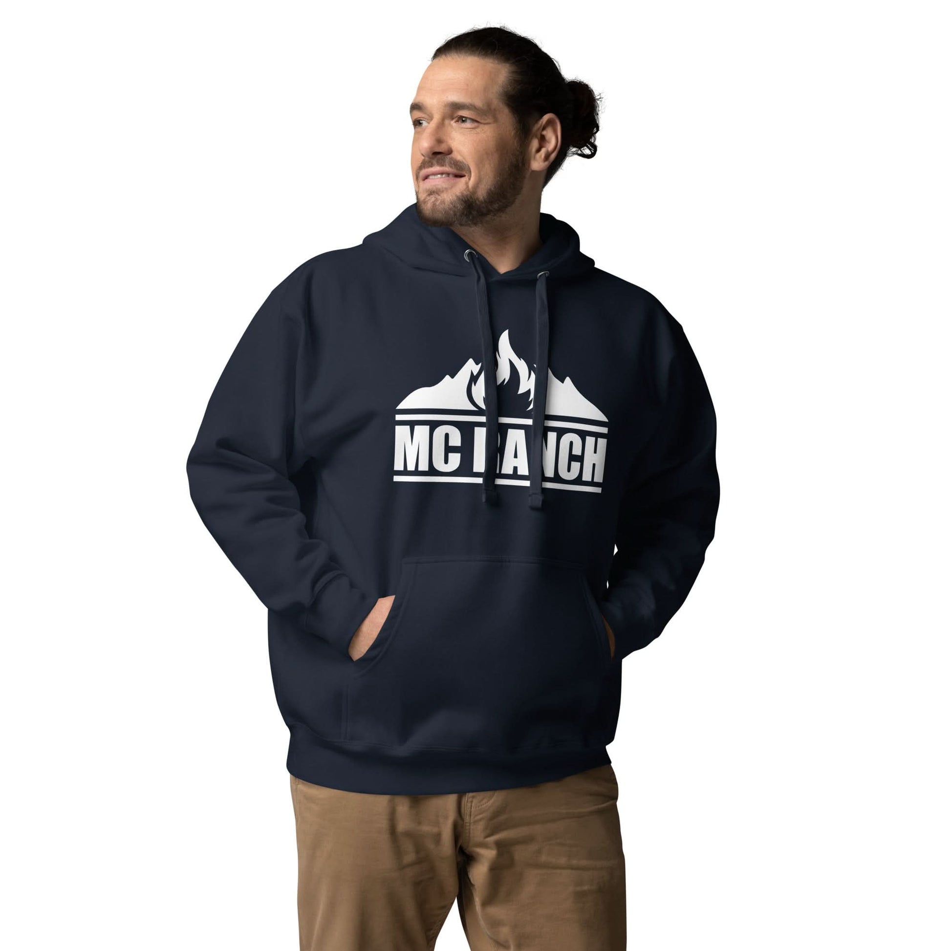 Man wearing navy hoodie with MC Ranch Overland logo